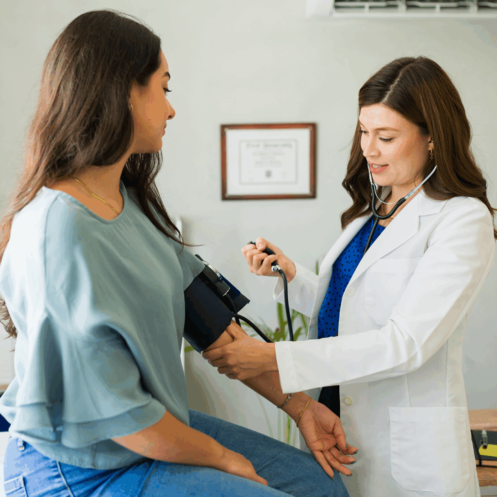 woman getting blood pressure taken