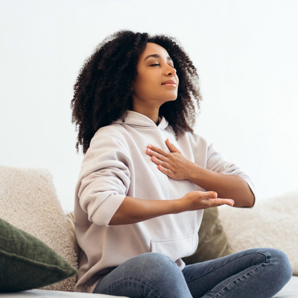 woman practicing breathing techniques