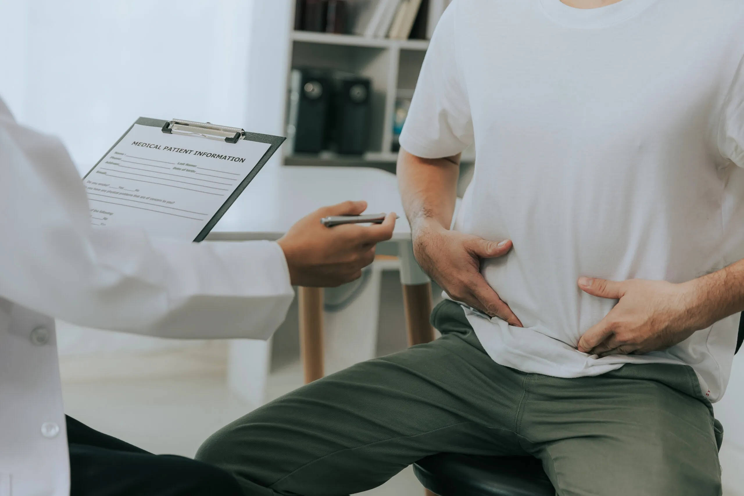 A doctor holds a clipboard labeled 