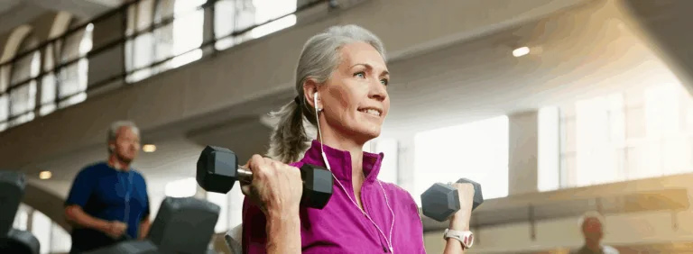 mature woman lifting weights